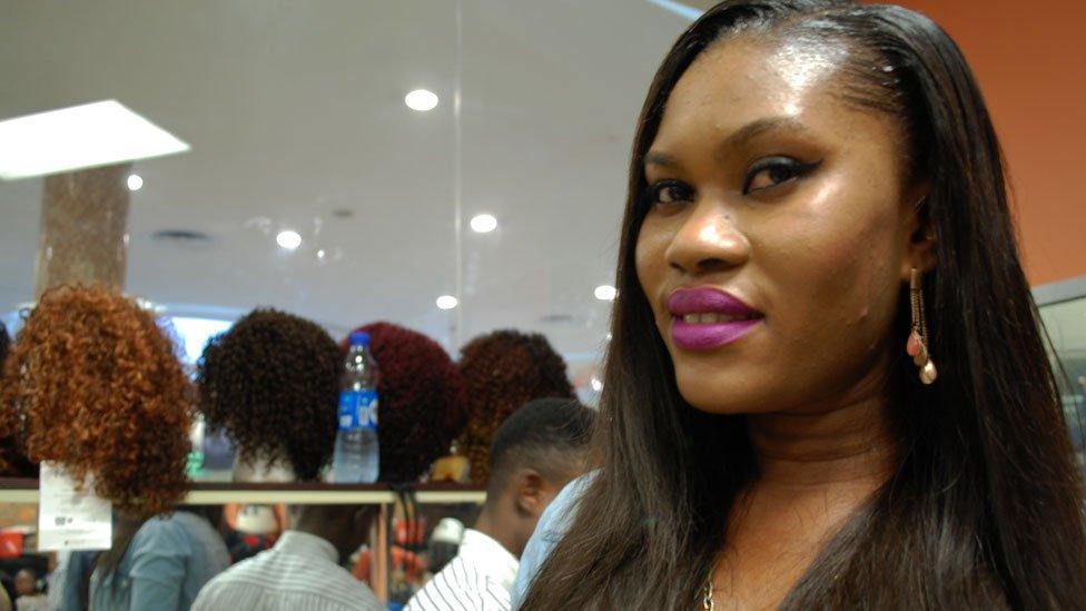 A customer at Bruno's Place hair salon in Ikeja Mall in Lagos, Nigeria