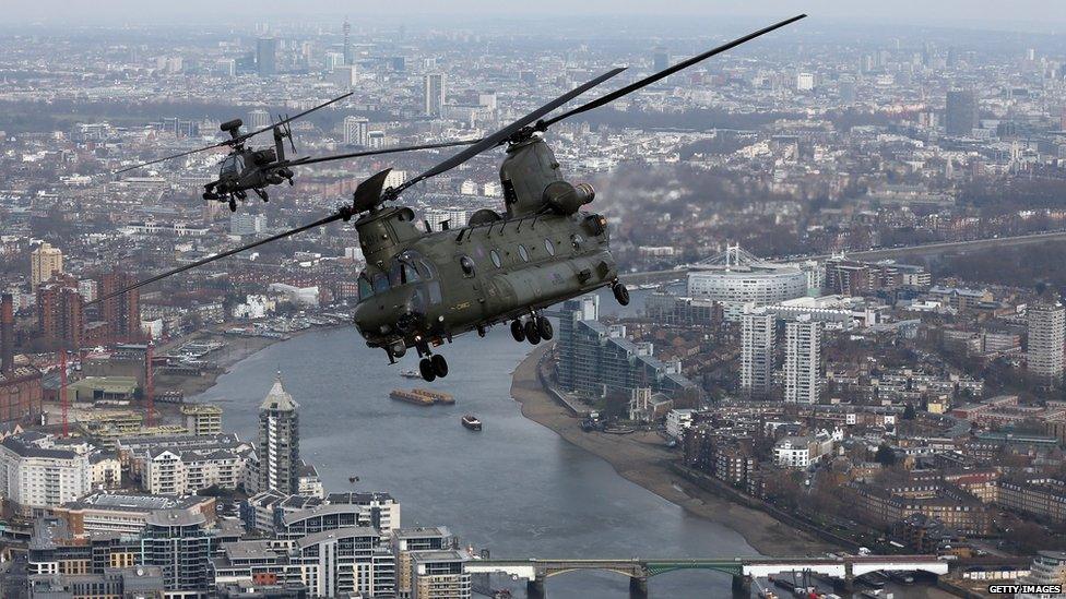 An RAF Chinook and Apache helicopters