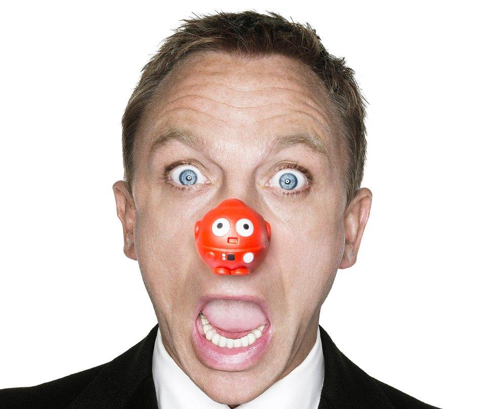 Daniel Craig wearing a red nose