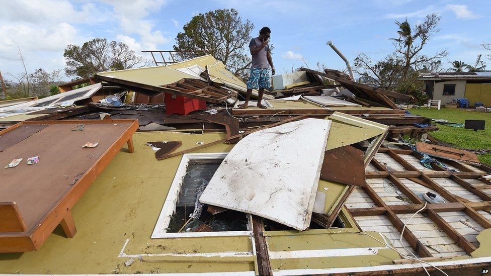 Adrian Banga surveys his destroyed house in Port Vila, Vanuatu in the aftermath of Cyclone Pam Monday, 16 March 2015