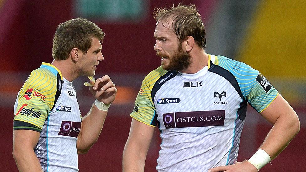 Dan Biggar (L) and Alun Wyn Jones in discussion during an Ospreys match