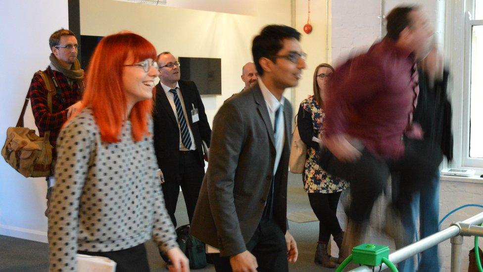 People try out an exhibit at the National Videogame Arcade