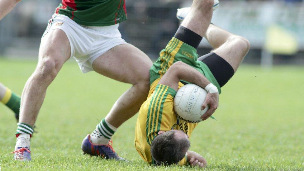 Donegal's Karl Lacey takes a tumble during the drawn Division One match against Mayo in Castlebar