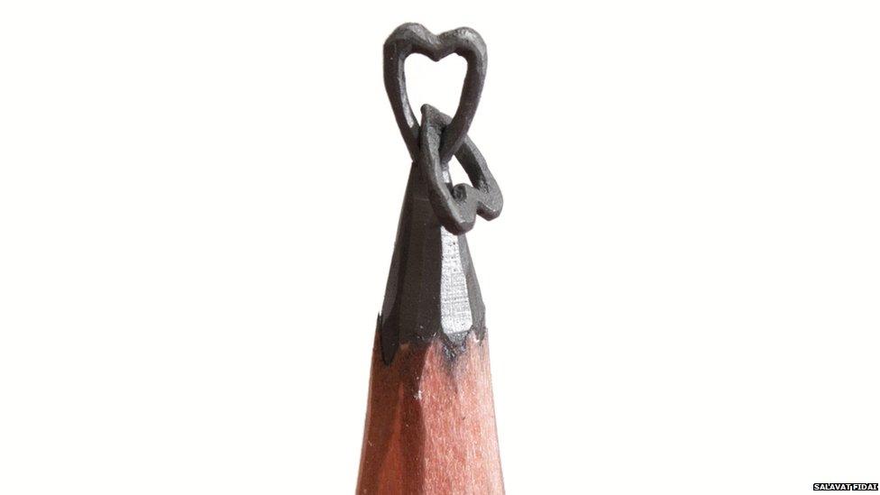 Heart on the tip of pencil