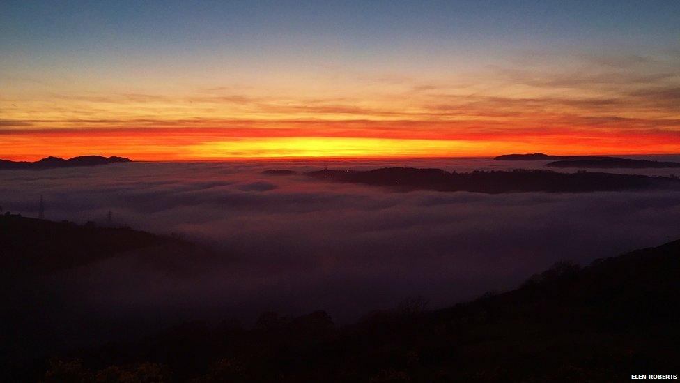 The sun setting on a misty evening in Colwyn Bay taken by Elen Roberts