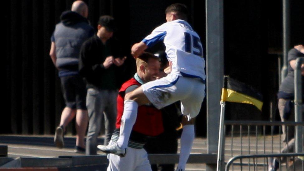 Bury's Ryan Lowe celebrates