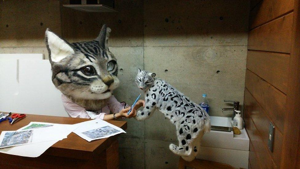 The giant cat's head was created out of felt