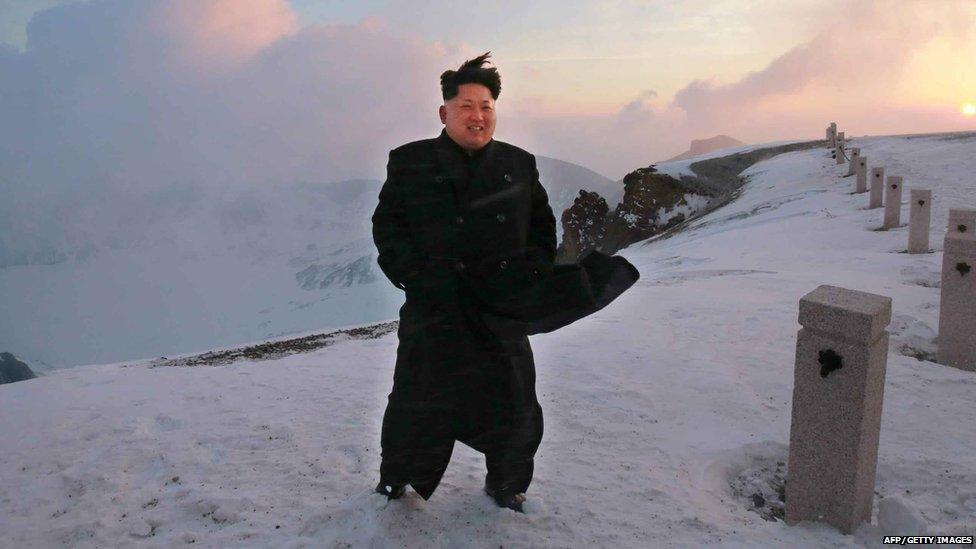 Kim Jong-Un on top of a mountain