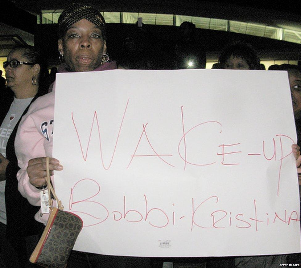 Bobbi Kristina Brown is 'awake' says father Bobby Brown at concert