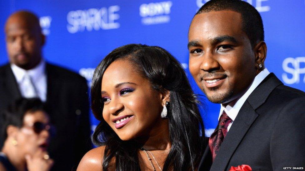 Bobbi Kristina Brown is 'awake' says father Bobby Brown at concert