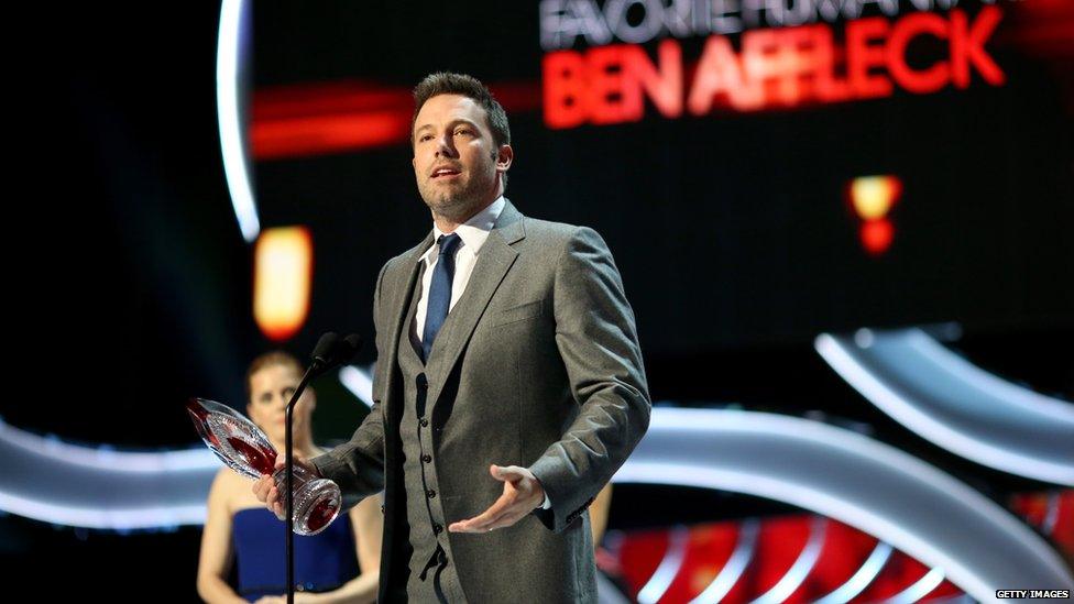 Ben Affleck receiving a people's choice humanitarian award