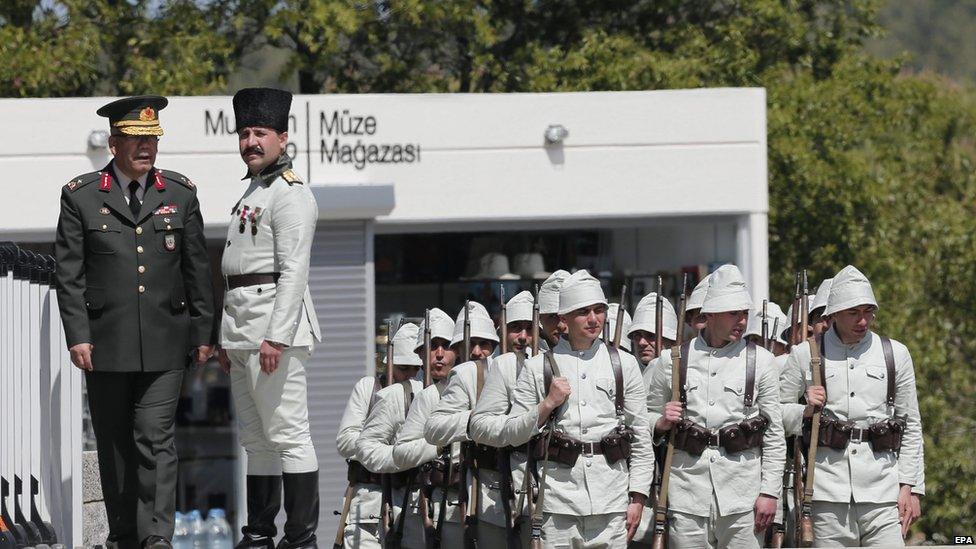 Turkish soldiers wait before the commemoration of the Battle of Gallipoli