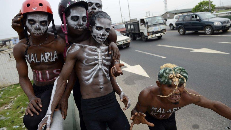 Actor dressed up as mosquitoes and skeletons warning that malaria kills in Lagos, Nigeria - Friday 24 April 2015