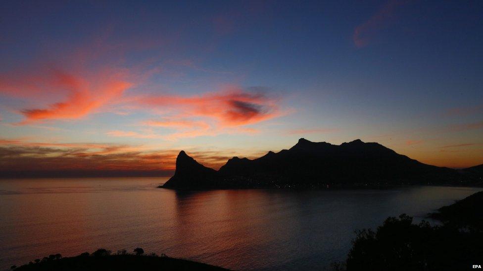 Sun setting over Sentinel mountain, Hout Bay, South Africa - Friday 24 April 2015