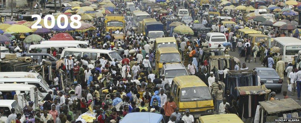 Buses and crowds in Oshodi market in Lagos, Nigeria - 2008