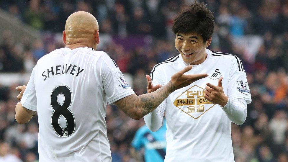 Swansea's Ki Sung-Yueng celebrates with Jonjo Shelvey after scoring