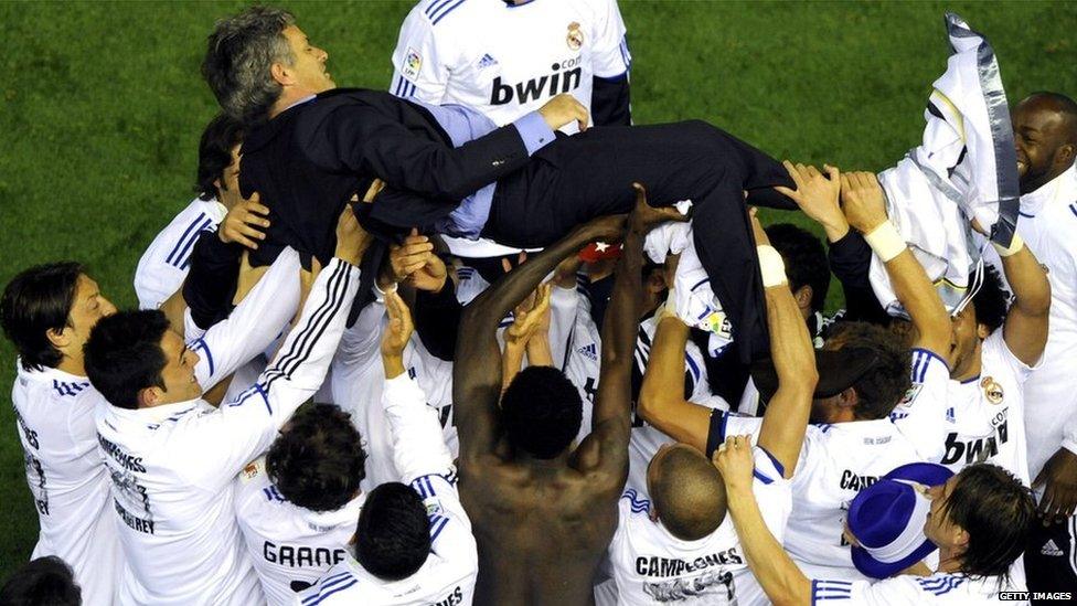 Jose Mourinho celebrates with his Real Madrid players