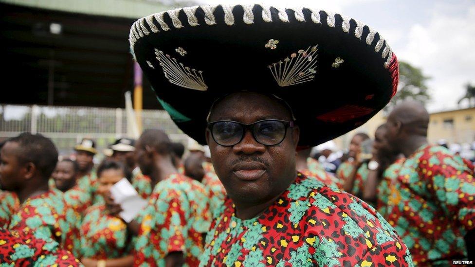 A man attends a parade marking Workers' Day in Nigeria's commercial capital Lagos 1 May 2015