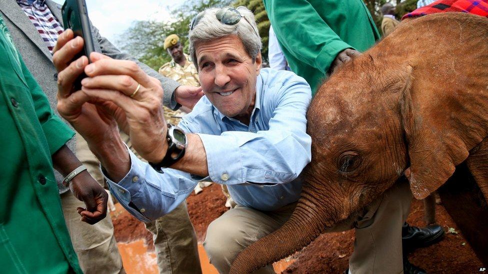 U.S. Secretary of State John Kerry taking a selfie with a baby elephant while touring the Sheldrick Center Elephant Orphanage at the Nairobi National Park, in Nairobi, Kenya on 3 May 2015
