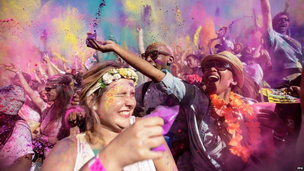 Party-goers partake in a festival better known as Holi One, during International Workers Day in Johannesburg, South Africa, 1 May 2015