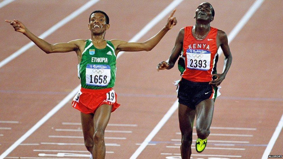 25 Sep 2000: Haile Gebrselassie of Ethiopia beats Paul Tergat of Kenya to win gold in the Mens 10000m Final at the Olympic Stadium on Day Ten of the Sydney 2000 Olympic Games in Sydney, Australia. \ Mandatory Credit: Mike Hewitt /Allsport