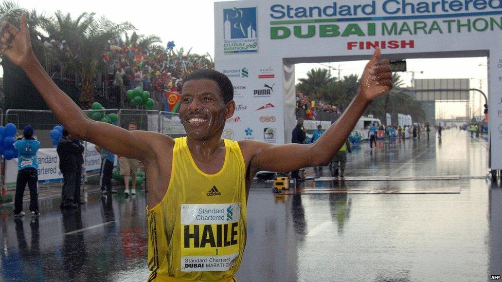 Ethiopian athletic legend Haile Gebrselassie celebrates after crossing the finish line of the Dubai Marathon 2009, the world's richest marathon, in the Gulf emirate on January 16, 2009. Gebrselassie finished in 2 hours, 05 minutes and 29 seconds, but failed to breake his own world record. AFP PHOTO/ HAIDER SHAH (Photo credit should read HAIDER SHAH/AFP/Getty Images)