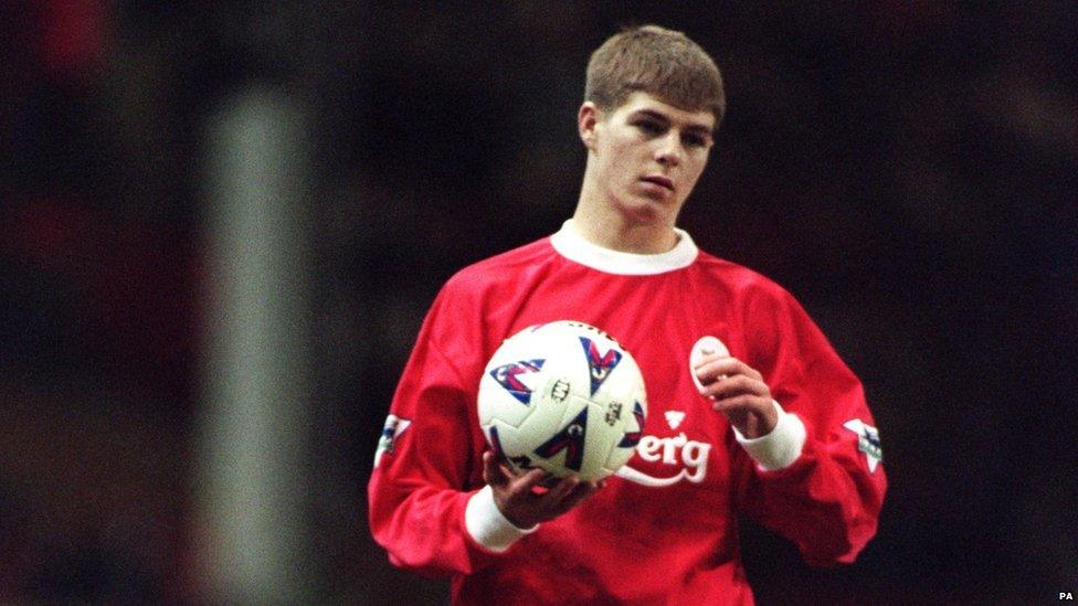 Steven Gerrard holding the ball