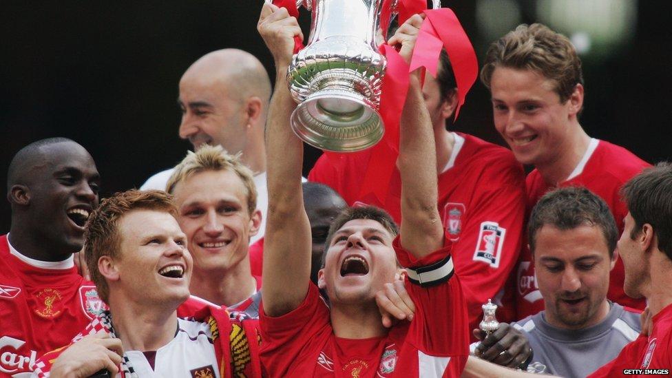 Steven Gerrard lifts the FA Cup