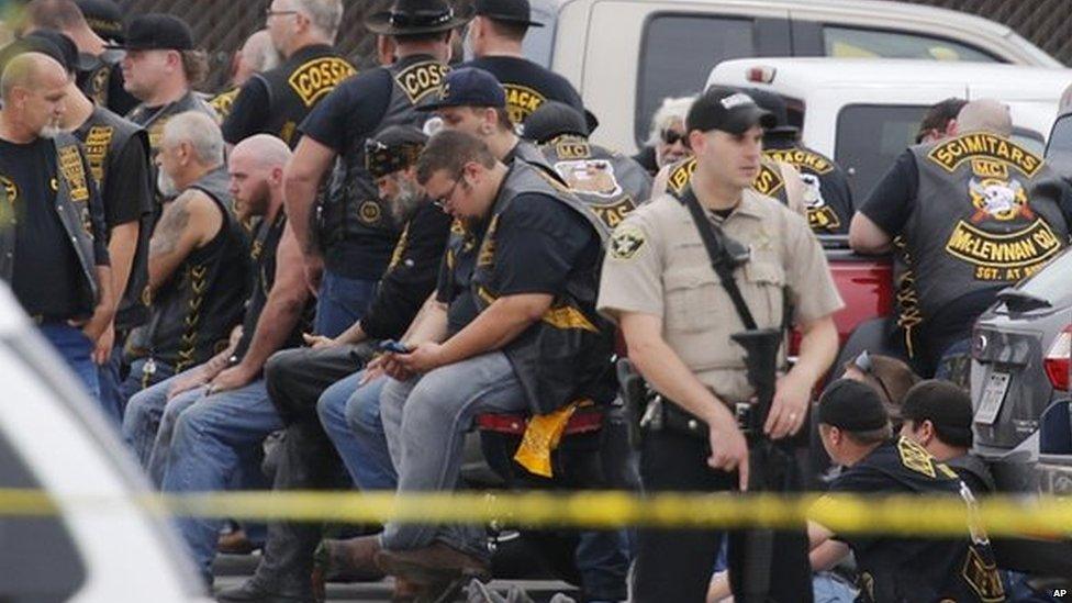 A group of motorcyclists with police in the parking lot of Twin Peaks, Waco. 17 May 2015