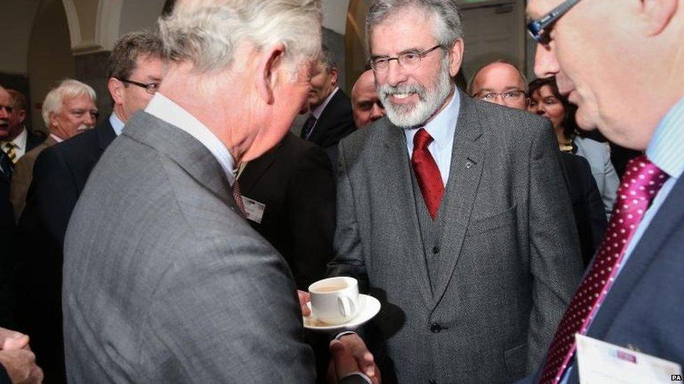 Prince Charles shakes hands with Sinn Fein leader Gerry Adams