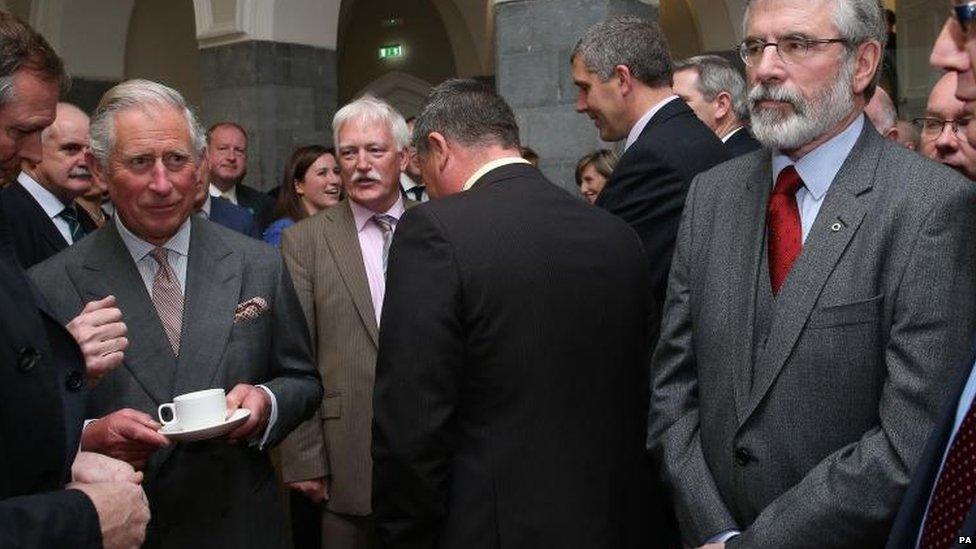 Sinn Fein leader Gerry Adams waits to meet Prince Charles