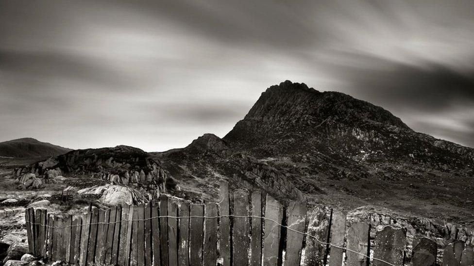 Slate fence (Crawia) with Tryfan in the background.