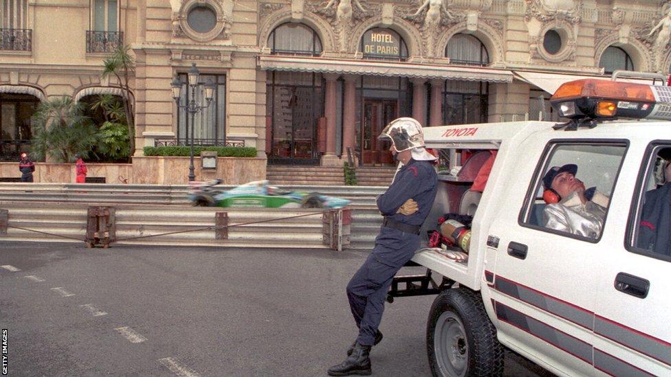 EMERGENCY SERVICES TAKE A BREAK WHILE ON STANDBY DURING THE FINAL DAY OF PRACTICE FOR THE MONACO GRAND PRIX