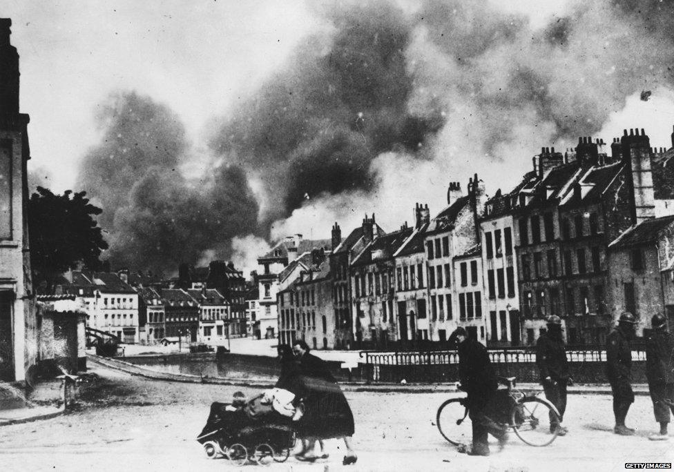 12th June 1940: Refugees fleeing during the German aerial bombardment of Dunkirk.