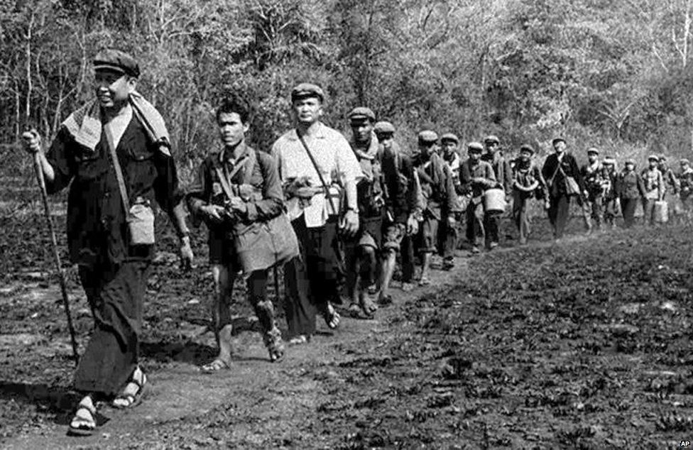 Pol Pot leading a group of his men