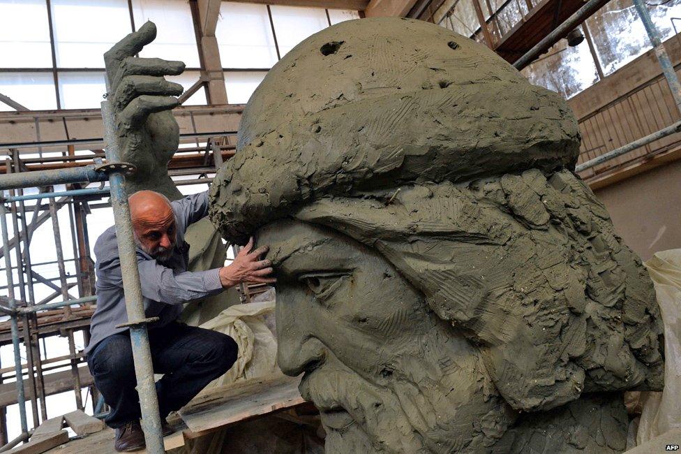 Russian artist Salavat Shcherbakov with a model for the monument of Grand Prince of Kiev, Vladimir the Great