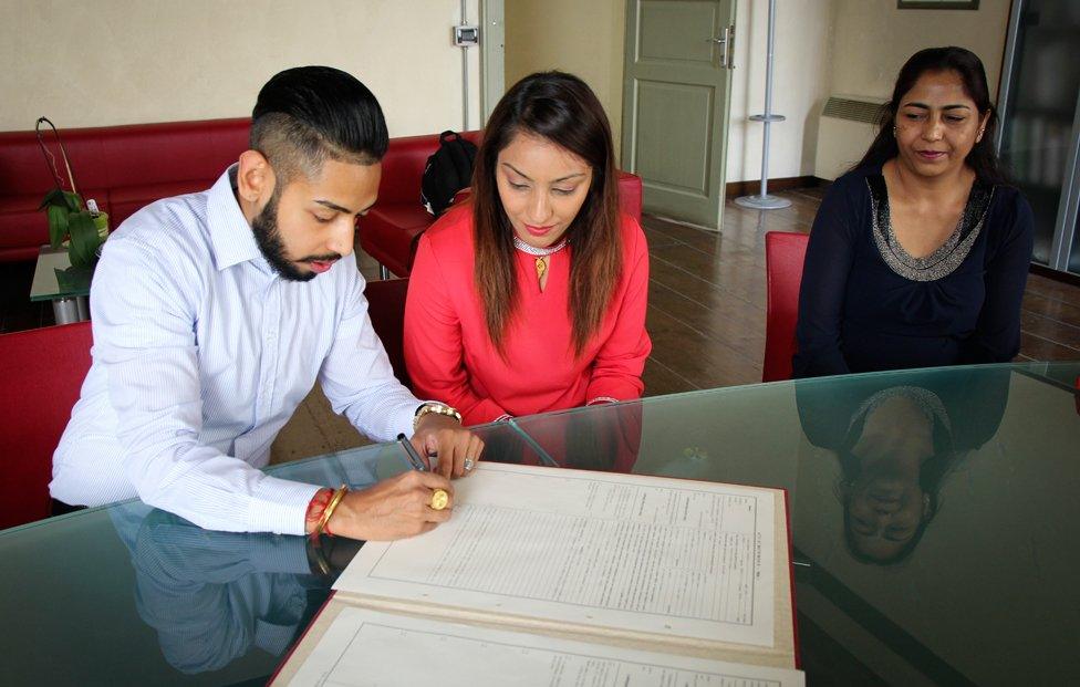 Signing the marriage register