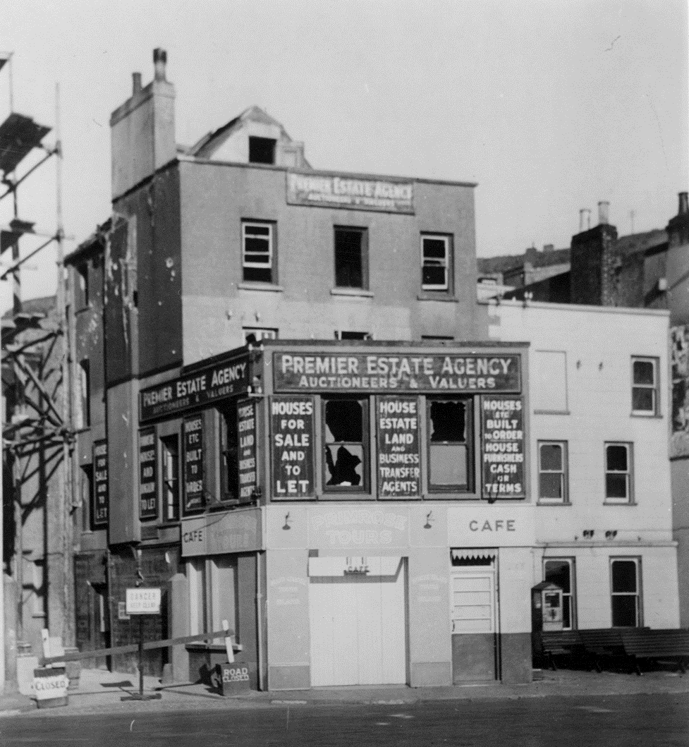 Blown out windows of a shop near Caledonia Place at the Weighbridge in St Helier