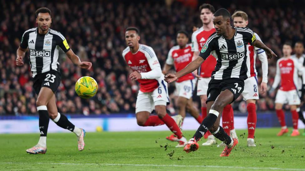 Alexander Isak scoring against Arsenal