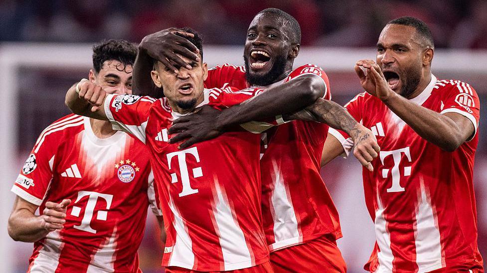 Bayern Munich players celebrate scoring against Real Madrid