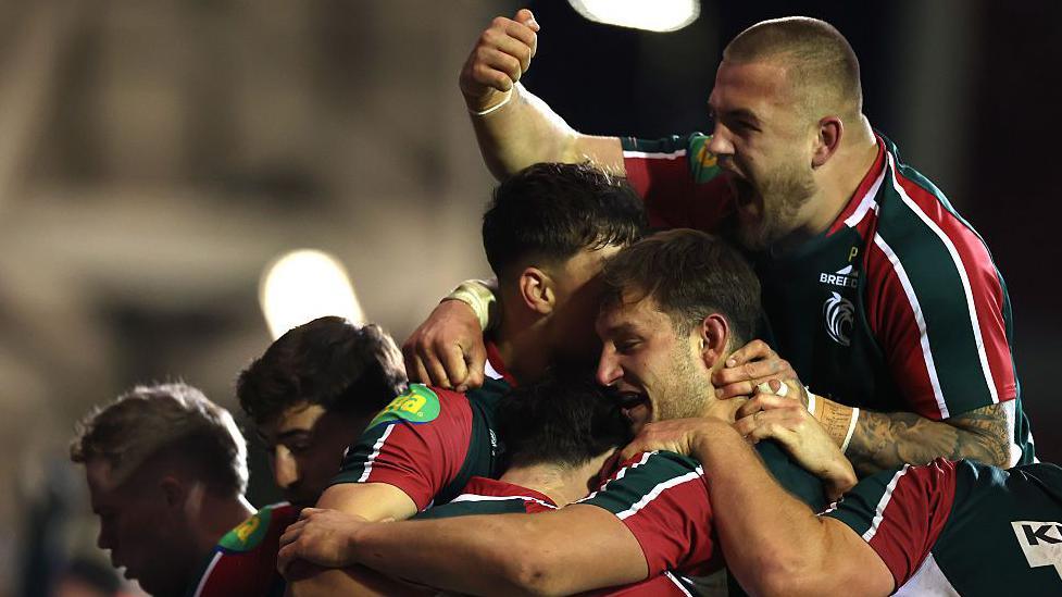 Leicester Tigers played celebrate exuberantly after scoring against rivals Northampton Saints 