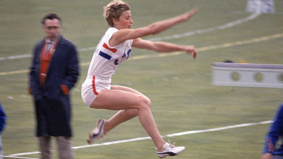 Mary Rand in action in the long jump at the 1964 Olympics
