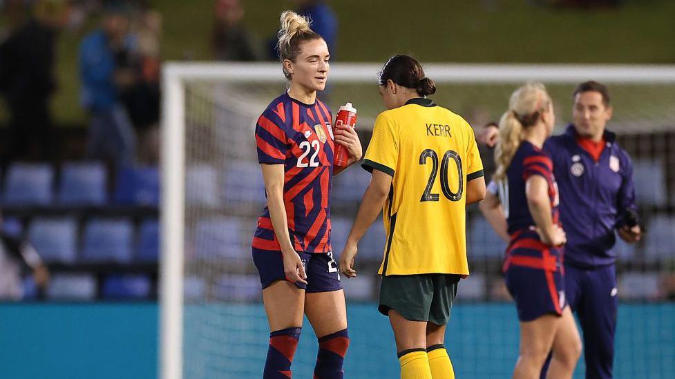 Kristie Mewis and Sam Kerr following a match between the USA and Australia in 2021