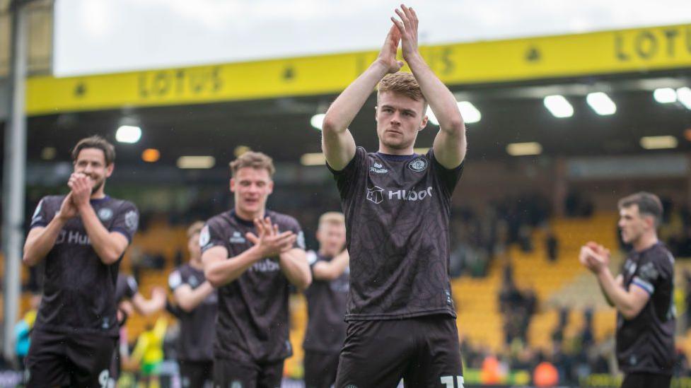 Tommy Conway claps the crowd after a game 