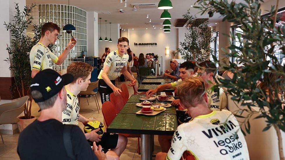 Team Visma | Lease a Bike team's Danish rider Jonas Vingegaard has a coffee break in a cafe during a team training session two days prior to the start of the 113th edition of the Tour de France cycling race