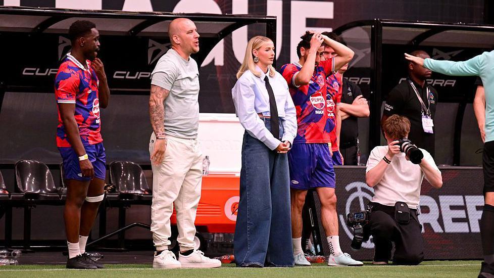 Chloe Kelly watches her team from the sidelines at Baller League UK
