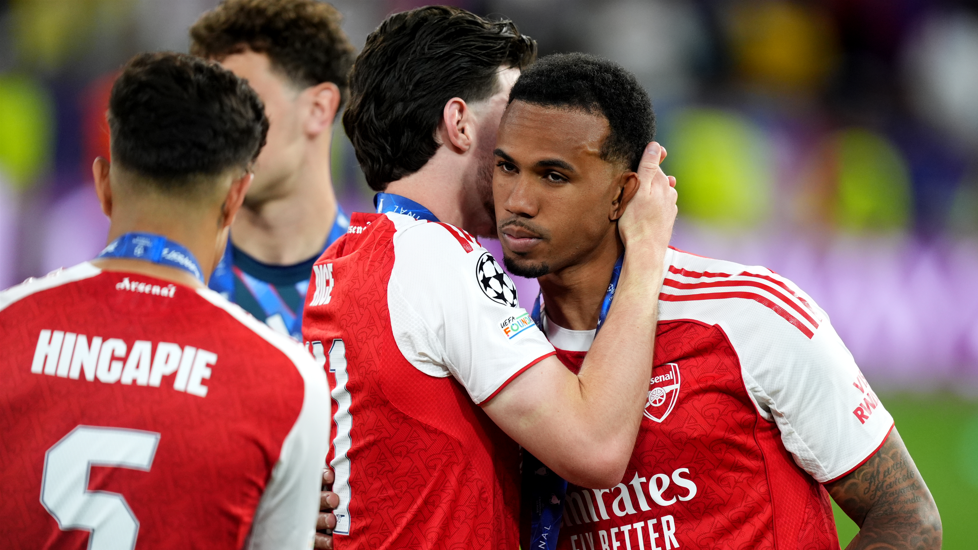 Arsenal's Declan Rice consoles teammate Gabriel during the UEFA Champions League Final 
