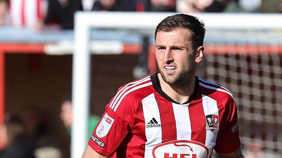 Ben Purrington in action for Exeter City