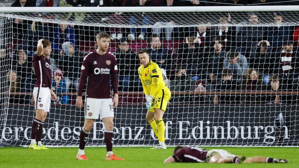 Hearts players dejected