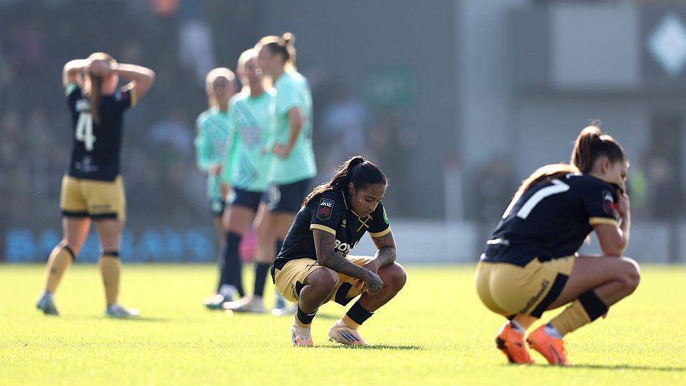 Manuela Pavi and Seraina Piubel look dejected after West Ham's defeat